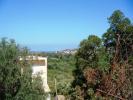 FAR REACHING VALLEY AND MOUNTAIN VIEWS TO THE SEA IN THE DISTANCE